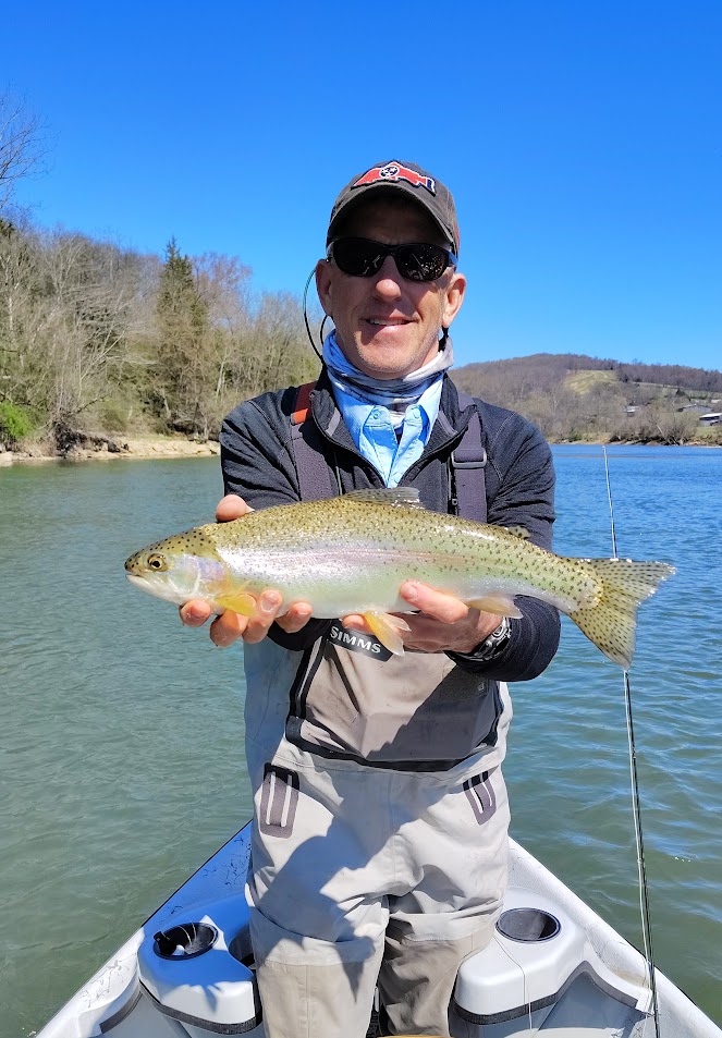 A Guy Holding a Holston River Rainbow Trout