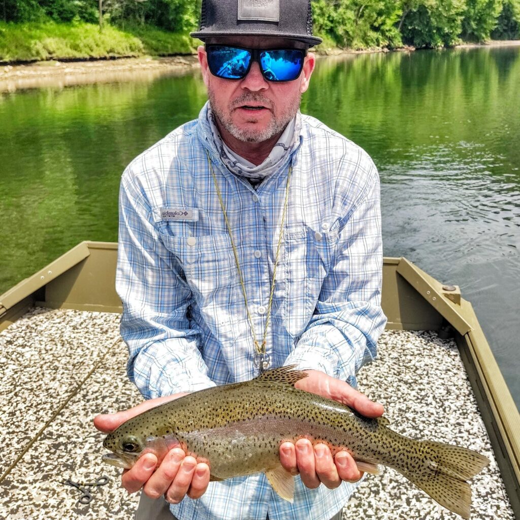 A beautiful Cumberland River rainbow trout held by an angler after being caught on an emerger pattern.