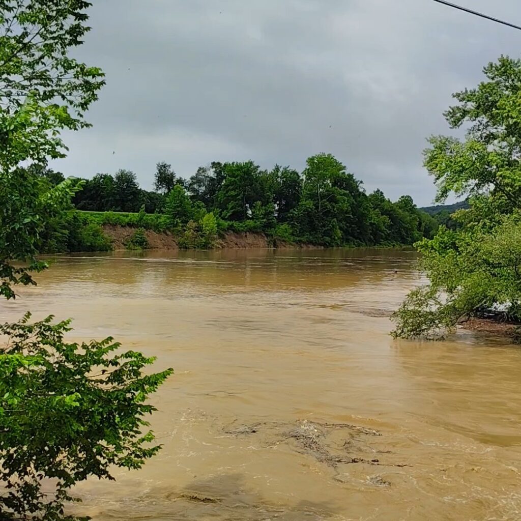 A view of the Cumberland River at flood stage near Crocus Creek in Burkesville, Kentucky.