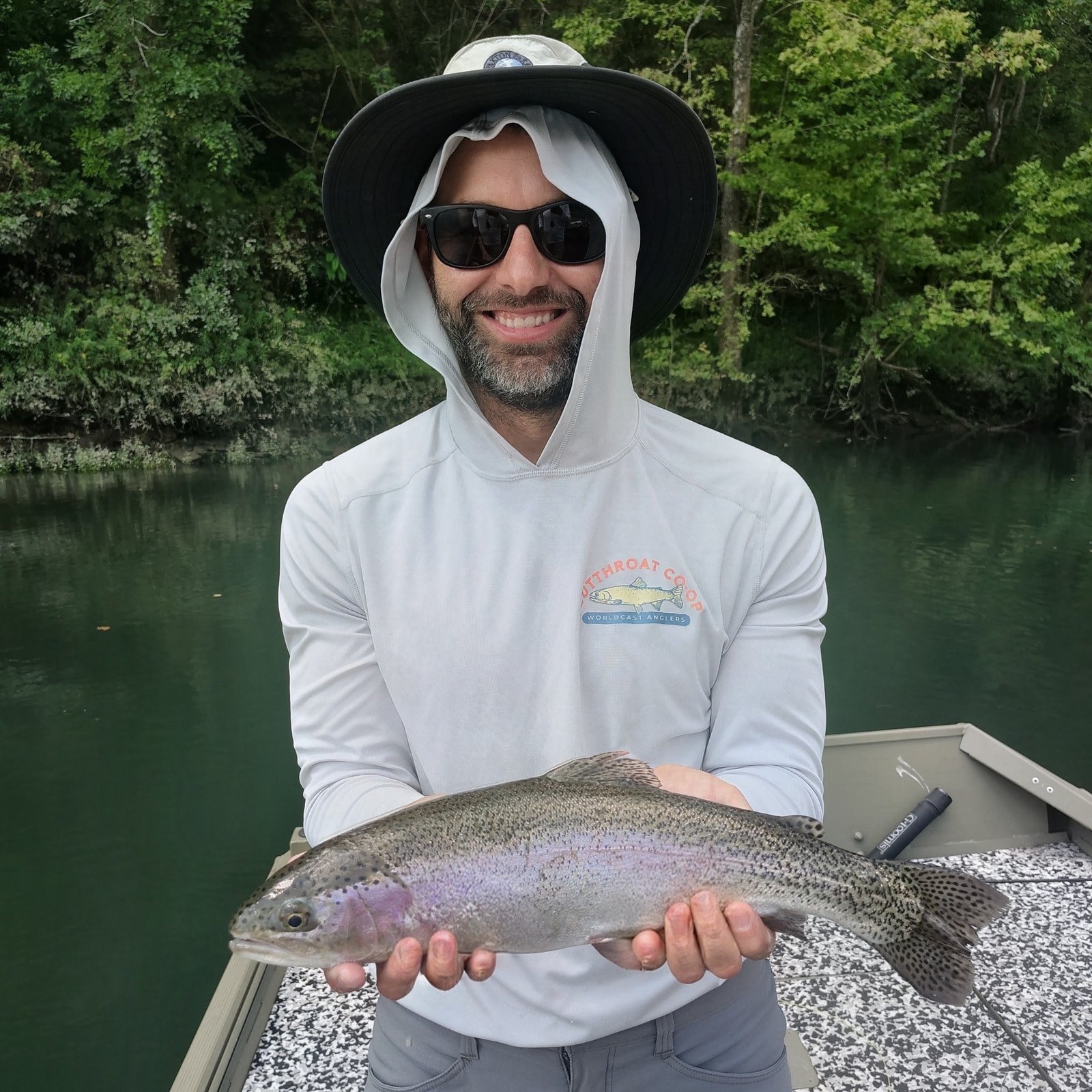 A man holding a Rainbow Trout
